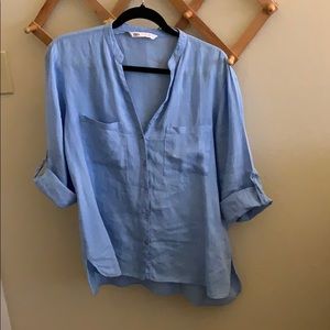 Blue linen shirt.
